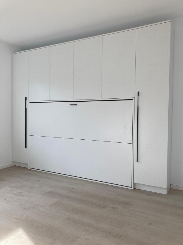 Just finished assembling my new white cabinet in the living room! It adds such a fresh and modern touch to the space.