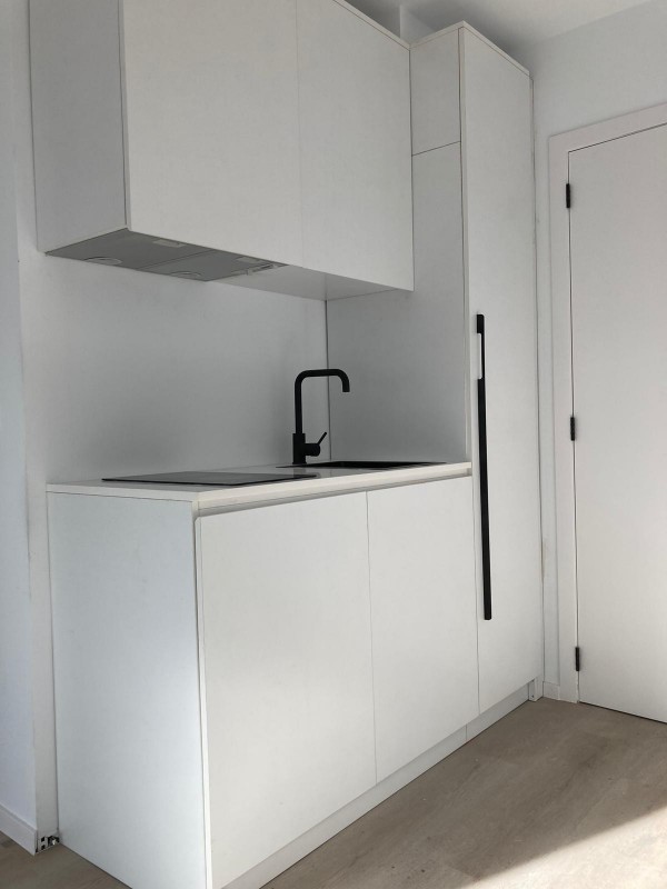 Loving my new white kitchen cabinets - they really brighten up the space!
