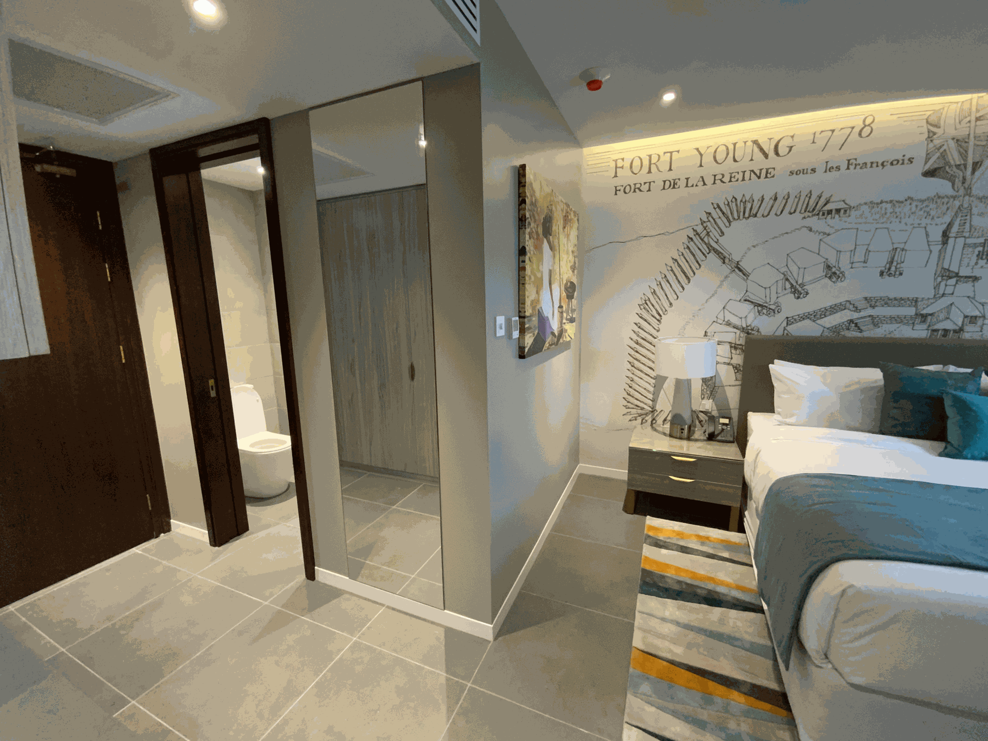 Just checked into my hotel room at Fort Young 1776. Loving the sleek interior design with the plaster walls and floor-to-ceiling glass shower.