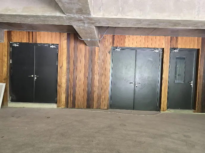 Steel Doors 3 black steel doors next to each other