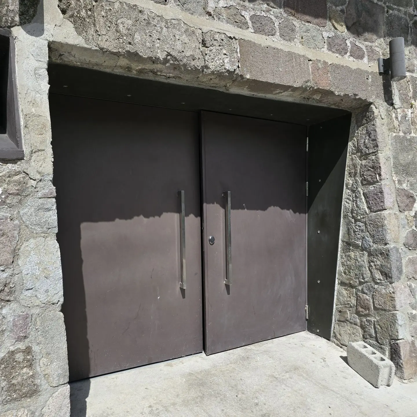 Steel Door A heavy and large double swing metal door
