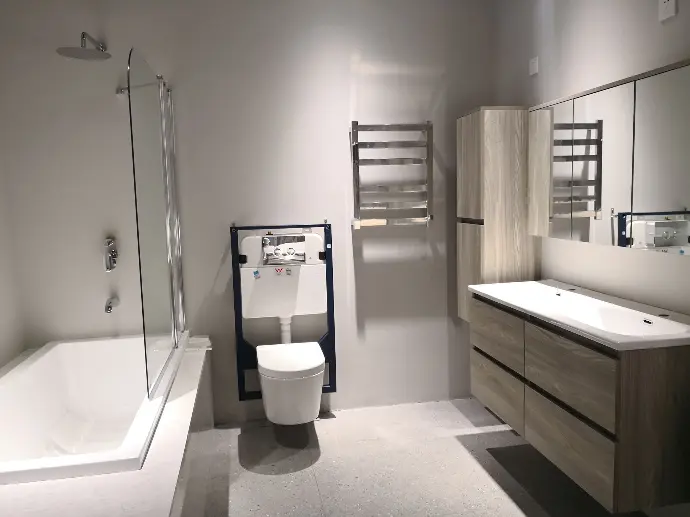 A stylish bathroom showcasing ceramic sanitary ware A contemporary bathroom with gleaming porcelain fixtures